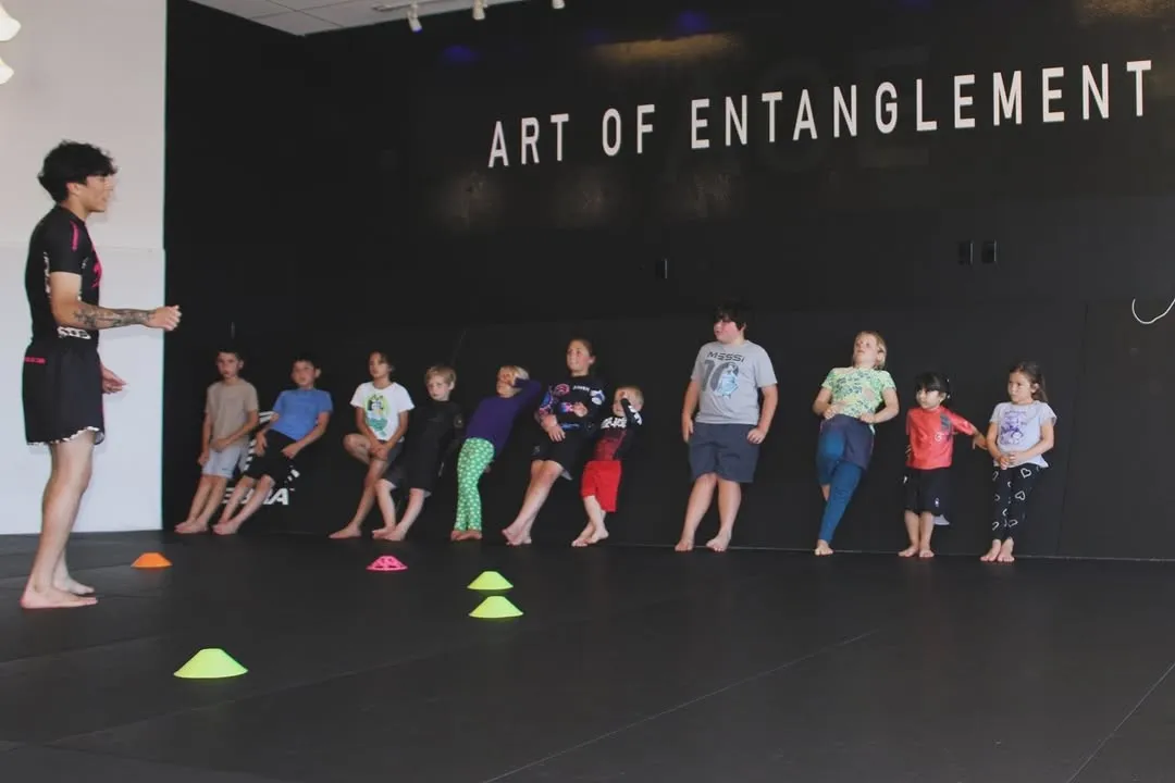Kids training in an age-grouped class at AOE in Monterey